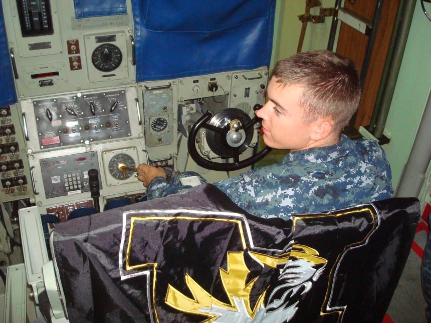 USS Columbia driving MU banner