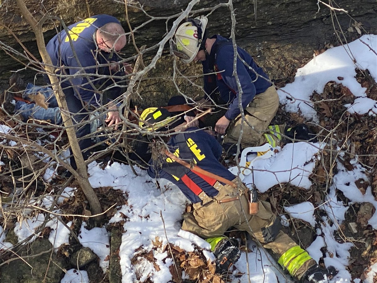Columbia firefighters rescue a person who fell about 30 feet down an embankment at Ashland Road and Hinkson Creek on Friday, Dec. 20, 2019.