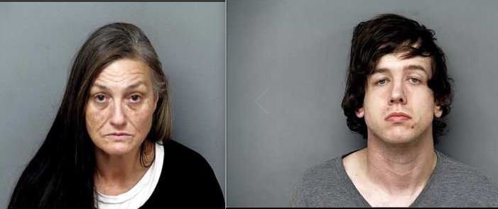 Guinn Burke (left) and William Musgrove are arrested and charged with arson on Monday, Jan. 27, 2020.