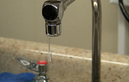A sink drips water.