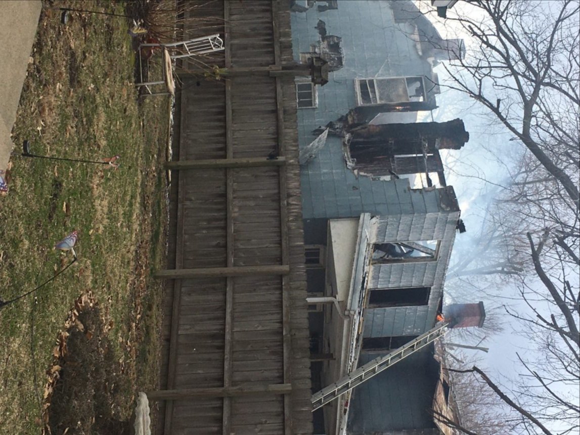 A fire destroys a home in California, Missouri.