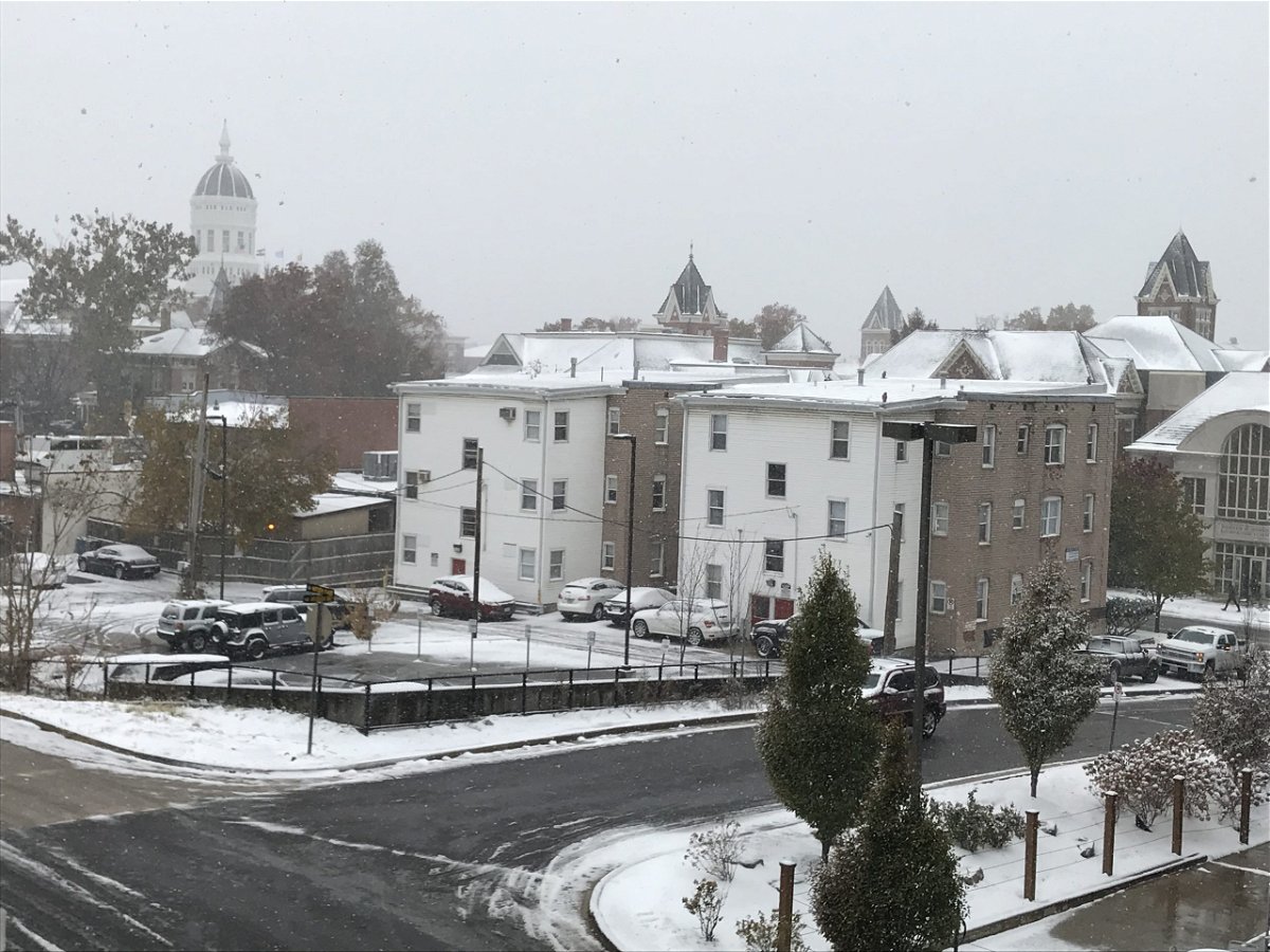 Snow falls on part of downtown Columbia near the University of Missouri campus Monday, Nov. 11, 2019.