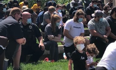 Columbia protesters take a knee