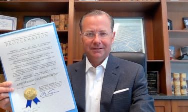 Columbia Mayor Brian Treece with Juneteenth proclamation