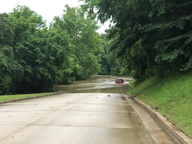 Floodwaters cover the road at Washington Park in Jefferson City.