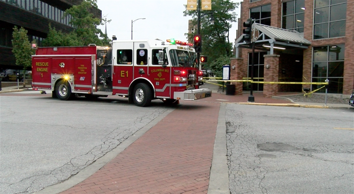 Firefighters taped off the entrance to the parking garage on Tenth Street on Friday, Sept. 11.