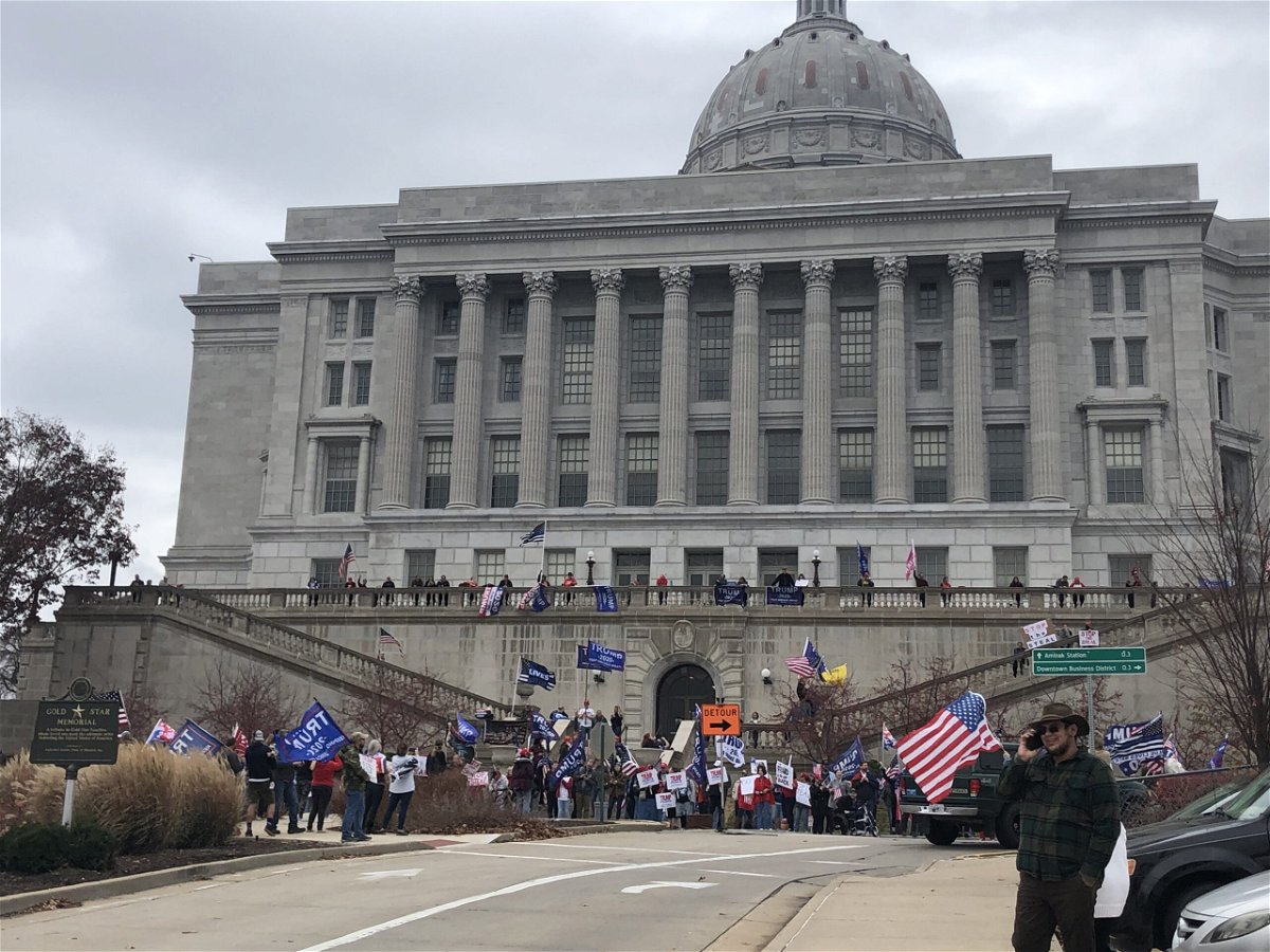 People gather at the state capital to show support for President Donald Trump