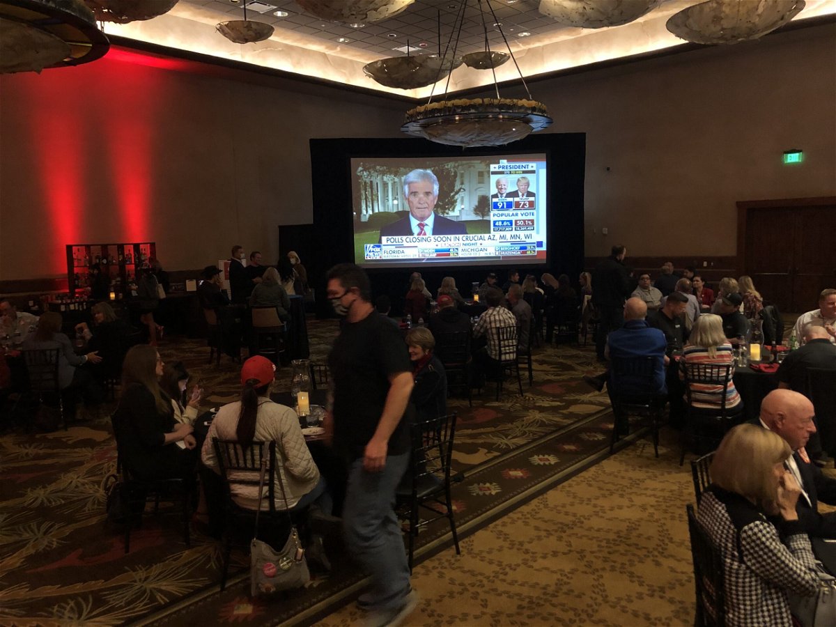 Republican Gov. Mike Parson's supporters gather inside the White River Conference Center in Springfield. 