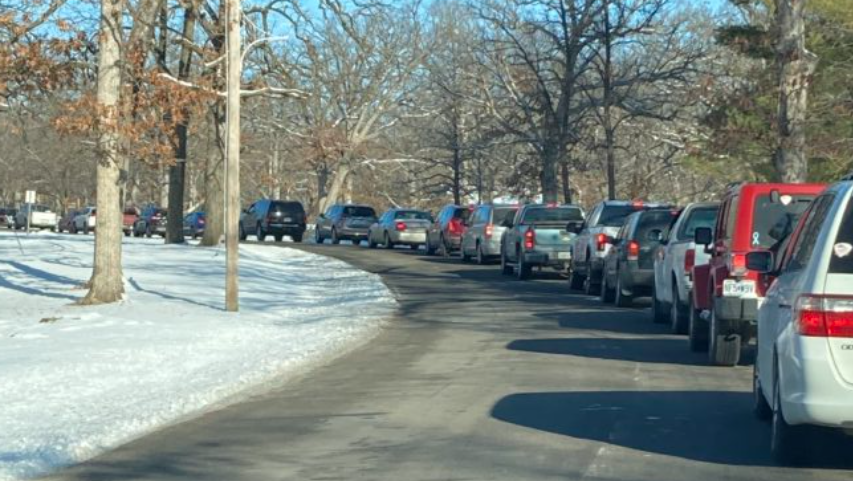 Cars line up in Rothwell Park in Moberly for a coronavirus vaccination clinic held Jan. 29, 2021, by the Randolph County Health Department.