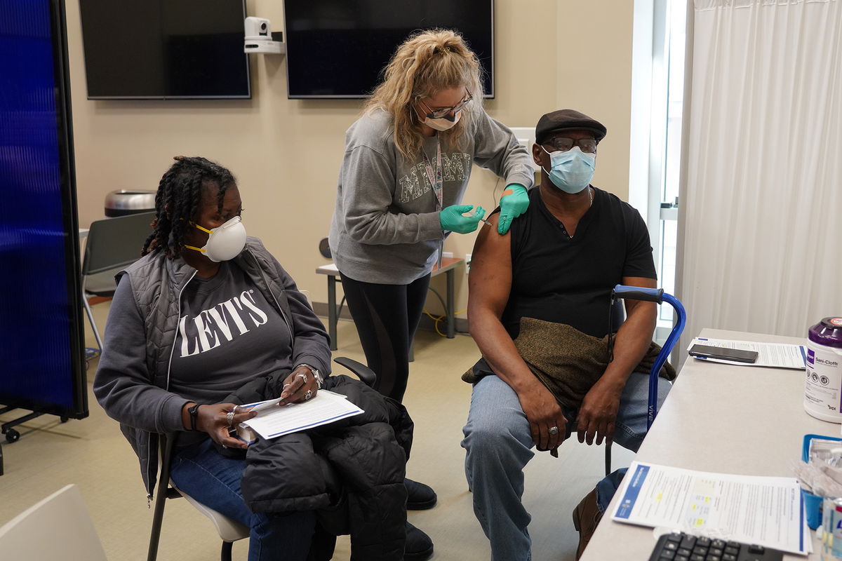 Jonathan Crews, Laureen’s husband and also a U.S. Army Veteran, was Truman VA’s 10,001 Veteran to be vaccinated.