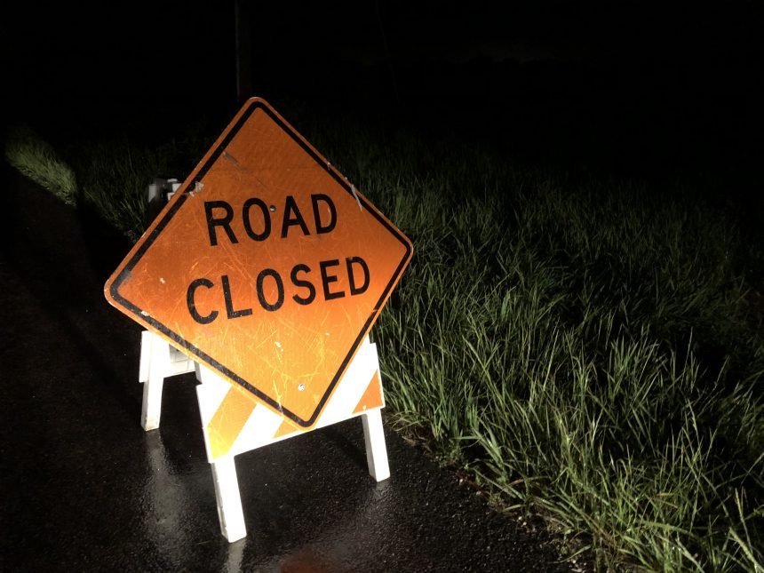 Road closed sign on N. Frink Rd. In Hallsville