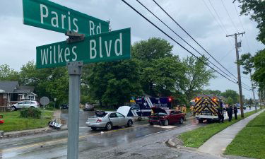 Fire and EMS crews work a two vehicle crash at Paris Rd and Wilkes Blvd.