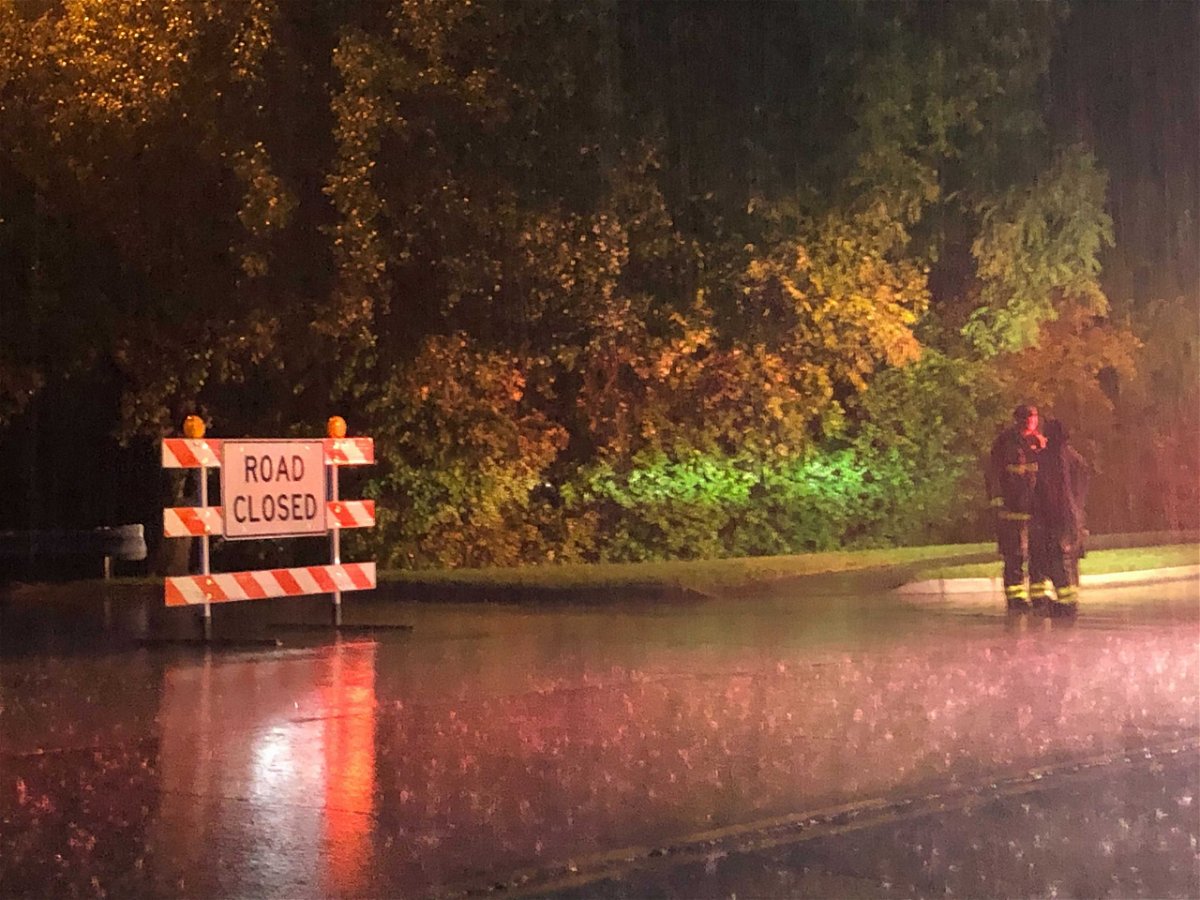Columbia firefighters close Nifong Boulevard at Glenn Eagle Drive because of flooding Friday, June 25, 2021.
