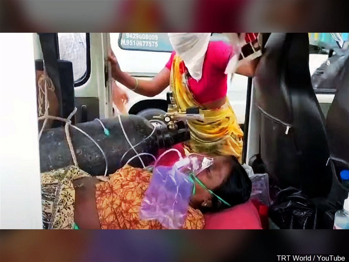 An Indian coronavirus patient is treated with oxygen.