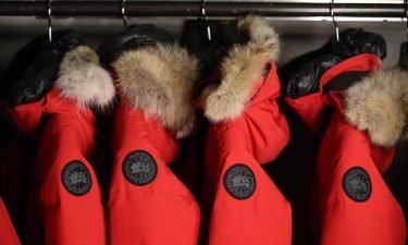 Canada Goose coats inside a cold room. The retailer said it will stop buying fur by the end of this year.