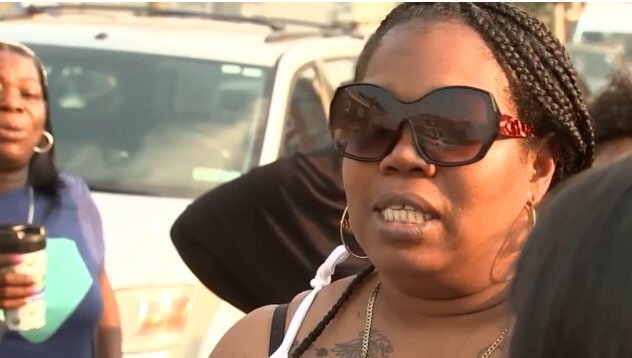 <i>WPVI</i><br/>Wadyia Gregory (sunglasses) speaks at a vigil for her 16-year-old son
