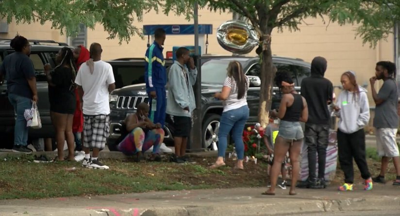 <i>WCCO</i><br/>Family and friends gather at the scene of a crash in Minneapolis that took the life of  40-year-old Leneal Frazier.