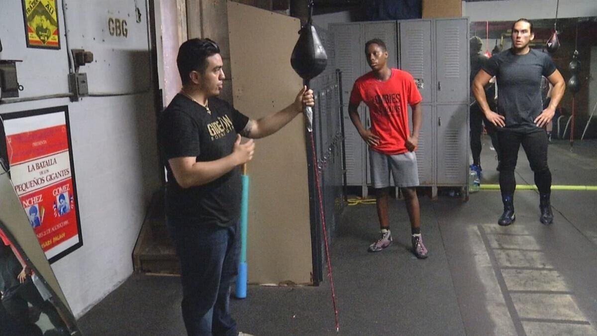 <i>WNEM</i><br/>Joe Medez (left) uses his gym to provide boxing instruction but aslo keep youth off the street.