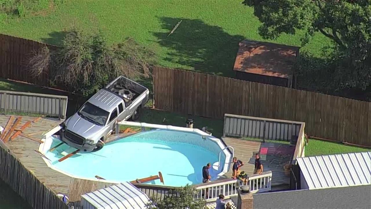 <i>KOCO</i><br/>A person is in custody after crashing a stolen vehicle into a pool in Yukon