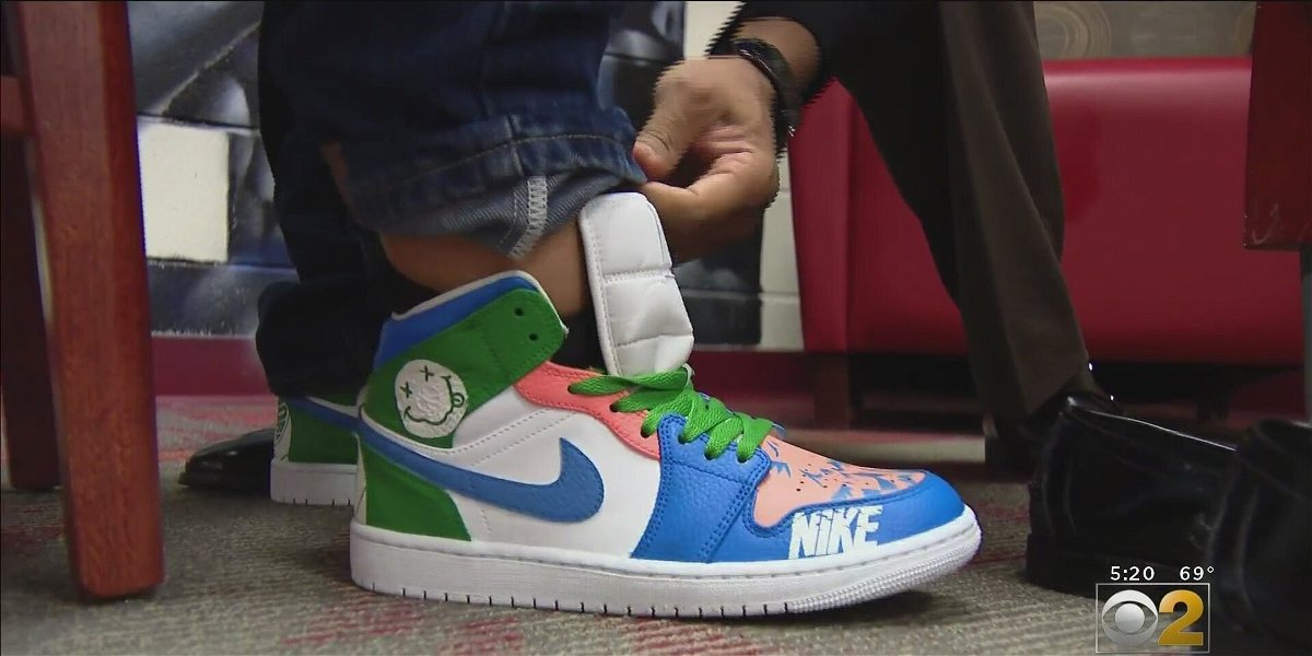 <i>WBBM</i><br/>A Chicago teacher found a way to reward his students with new sneakers that he hand painted after they designed them.