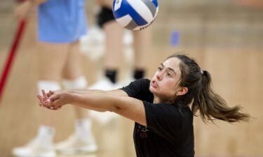 High school volleyball player Caroline Jurevicius lifts a shot during Nebraska's Dream Team volleyball camp. Jurevicius committed to Nebraska.
