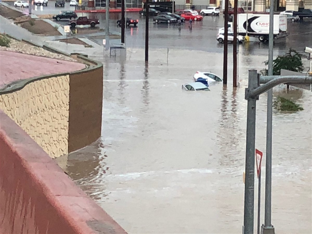 <i>KVIA</i><br/>El Paso roads overwhelmed with flood water and cars submerged.