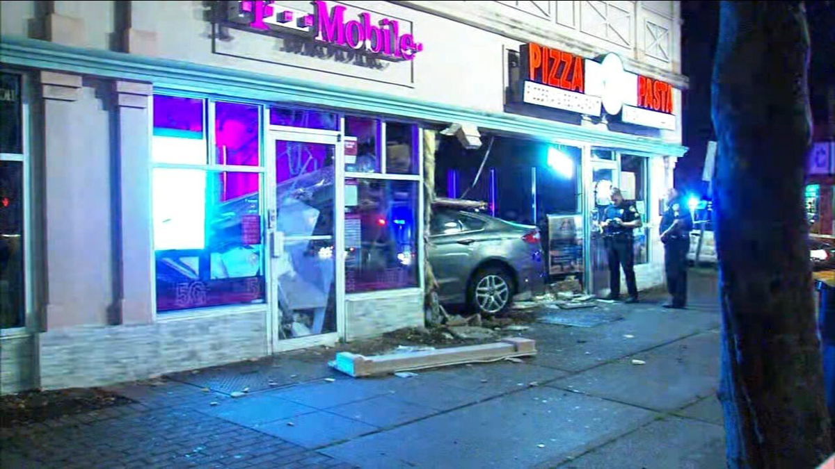 <i>WABC</i><br/>Police say a stolen SUV driven by a 24-year-old woman smashed through the front of a Belleville pizzeria and adjacent cell phone store