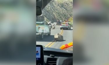 Boulders scattered across a major California highway blocked traffic on Thursday.