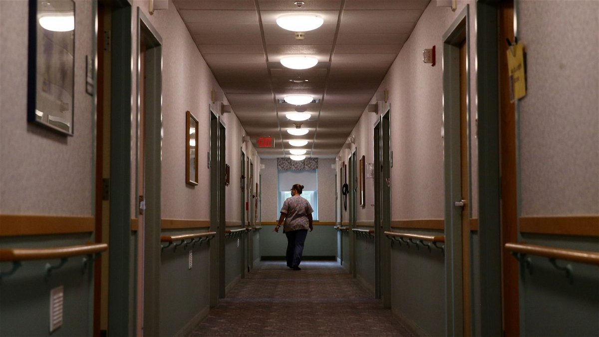 <i>Craig F. Walker/The Boston Globe via Getty Images</i><br/>Julie Moore recalls harrowing experiences from the pandemic inside the Philadelphia nursing home where she works.
