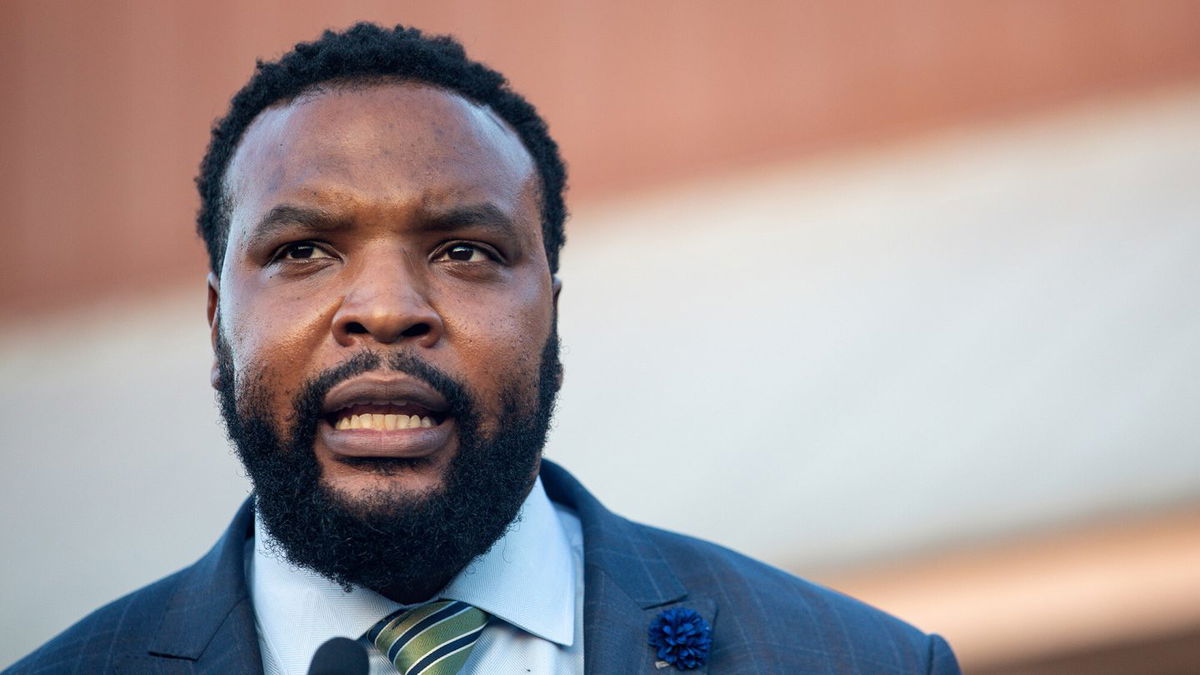 <i>Montinique Monroe/Getty Images</i><br/>Attorney Lee Merritt speaks during a candle light vigil in honor of Jonathan Price on October 5