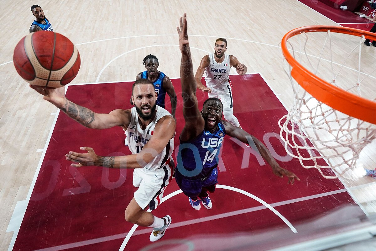 <i>Eric Gay/AFP/Getty Images</i><br/>France's Evan Fournier goes for the basket past USA's Draymond Green at the Saitama Super Arena in Saitama