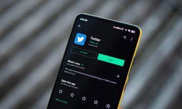 India's government says Twitter should be held liable for what users post. A person opens the twitter app on their phone in Assam