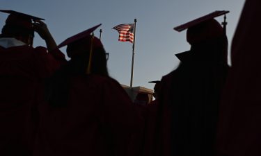 Students participate in a graduation ceremony on June 14