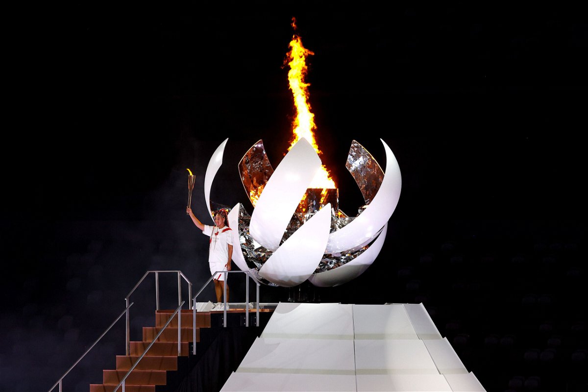 <i>Maddie Meyer/Getty Images</i><br/>Naomi Osaka of Team Japan lights the Olympic cauldron with the Olympic torch during the opening ceremony of the Tokyo 2020 Olympic Games on July 23.