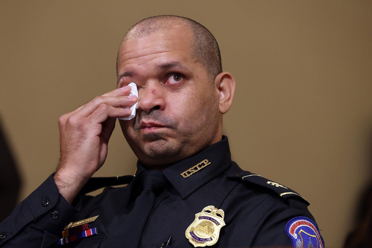 <i>Chip Somodevilla/Getty Images</i><br/>U.S. Capitol Police officer Sgt. Aquilino Gonell becomes emotional as he testifies before the House Select Committee investigating the January 6 attack on the U.S. Capitol on July 27 at the Canon House Office Building in Washington