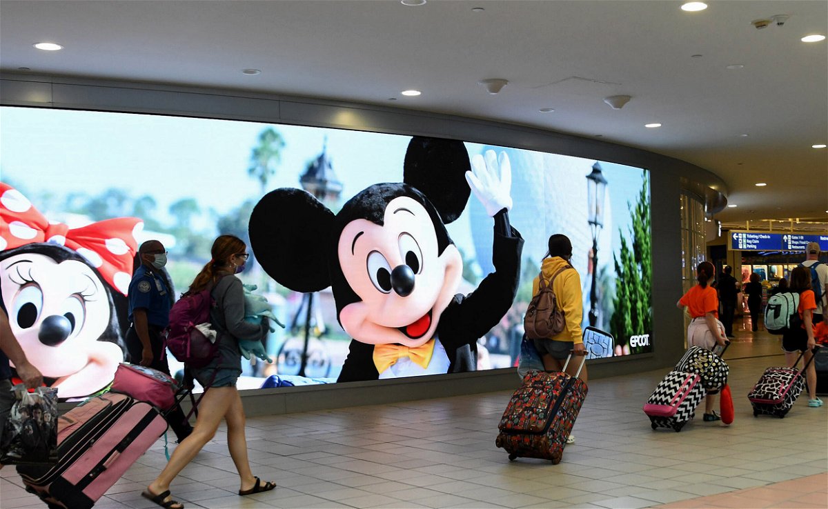 <i>Paul Hennessy/SOPA Images/LightRocket/Getty Images/FILE</i><br/>The mayor of the Florida county that's home to Disney World and Universal Studios is sounding the alarm on a spike of Covid-19 cases in the area