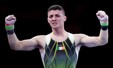 Rhys McClenaghan celebrates during the FIG Artistic Gymnastics World Championships on October 12