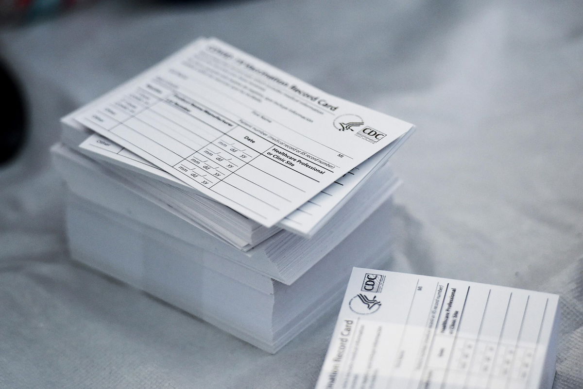 <i>Ben Hasty/MediaNews Group/Reading Eagle/Getty Images</i><br/>A stack of COVID-19 Vaccination Record Cards is pictured from the CDC. The commanding general of the Army base at Fort Rucker