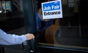 A job seeker arrives at a Job News USA career fair in Louisville