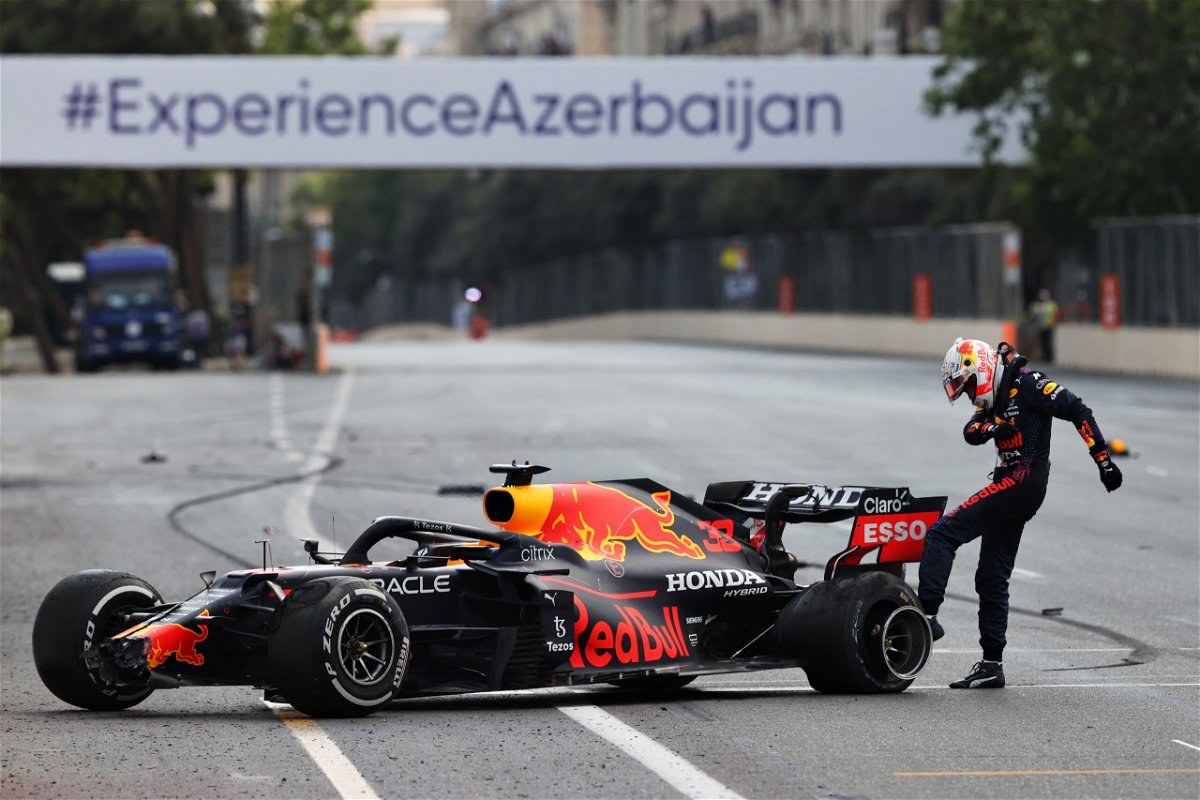 <i>Clive Rose/Getty Images</i><br/>Max Verstappen kicks his tire after crashing out in Azerbaijan.