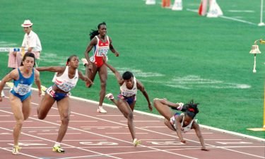 Devers (right) dives across the finish line of the 100m hurdles final at the 1992 Olympics having hit the last hurdle.