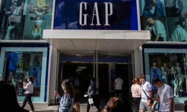 Shoppers pass the GAP store on Oxford Street on June 10 in London