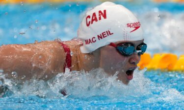 Canada's Margaret Macneil won the gold medal in the women's 100-meter butterfly at the Tokyo Olympics.