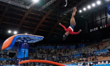 Simone Biles performs on the vault during the artistic gymnastics women's final at the 2020 Summer Olympics.