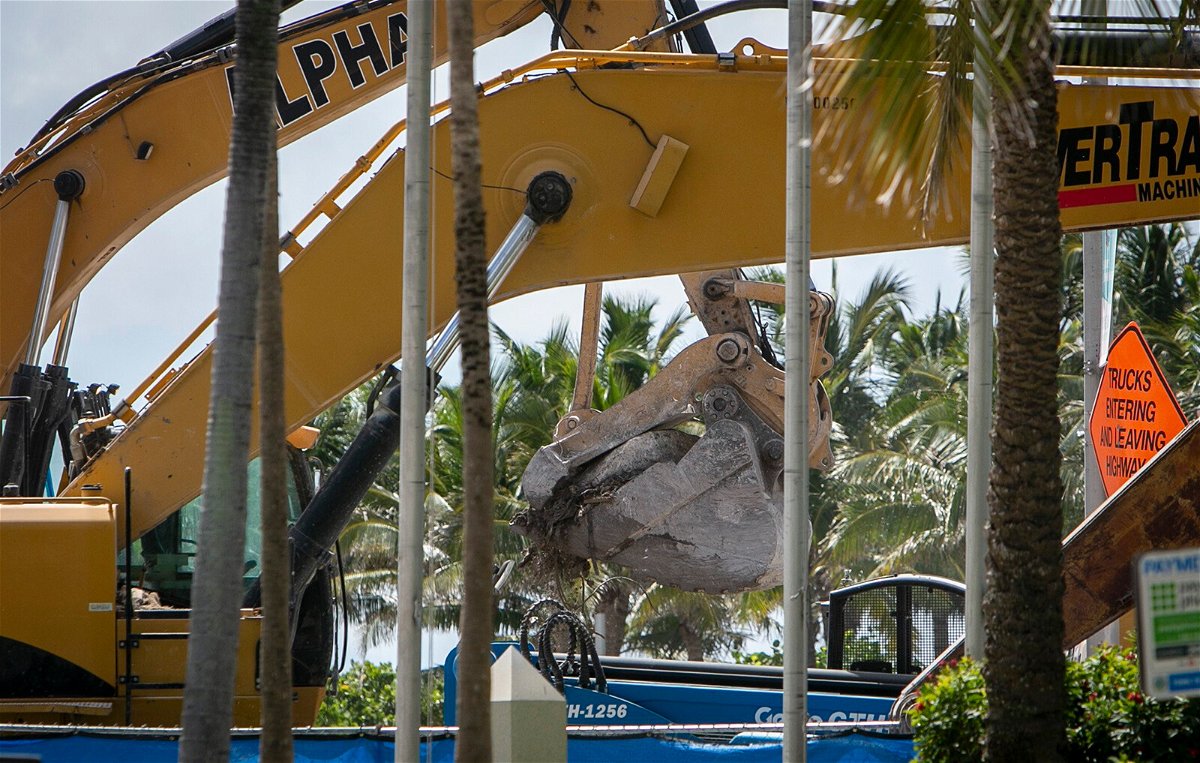 <i>Jose A. Iglesias/AP</i><br/>Search crews have been nearing the bottom of a pile of rubble left behind after a Surfside condo building collapsed nearly a month ago