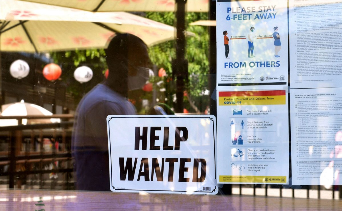 <i>Frederic J. Brown/AFP/Getty Images</i><br/>Restaurant workers are calling it quits just as people are starting to dine out again and restaurants rush to reopen.