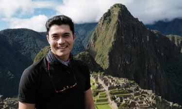 Henry Golding shares a few rules on personal travel: Eat street food