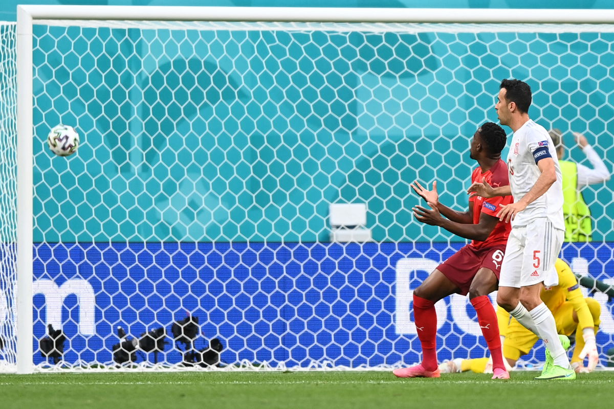 <i>KIRILL KUDRYAVTSEV/AFP/POOL/AFP via Getty Images</i><br/>Spain beats Switzerland in nail-biting penalty shootout to reach Euro 2020 semifinals as Denis Zakaria watches as his deflection puts Spain ahead in the match.