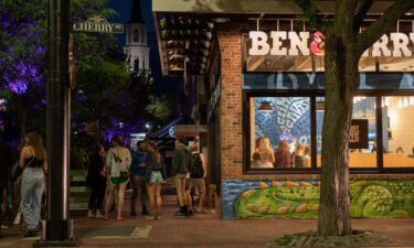 People wait in line for Ben & Jerry's ice cream in downtown Burlington.