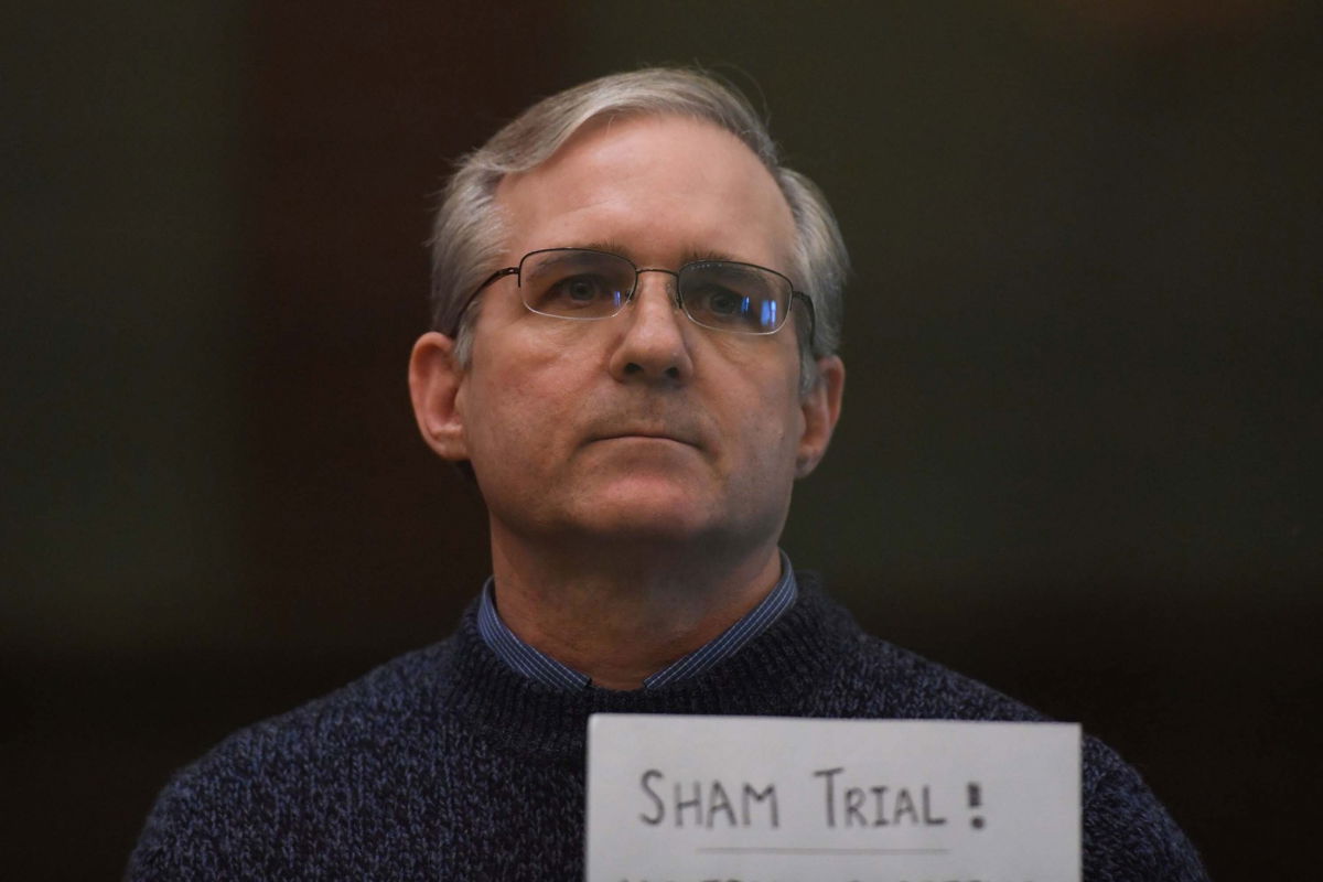 <i>KIRILL KUDRYAVTSEV/AFP/Getty Images</i><br/>Paul Whelan stands inside a defendants' cage as he waits to hear his verdict in Moscow on June 15